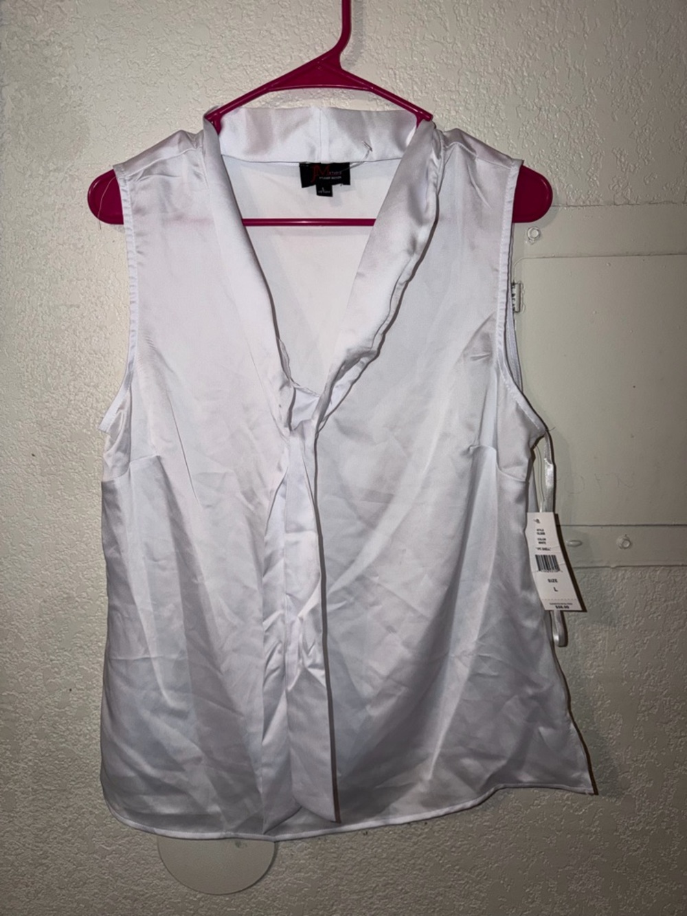 Sleeveless White V-Neck Tie-Front Blouse